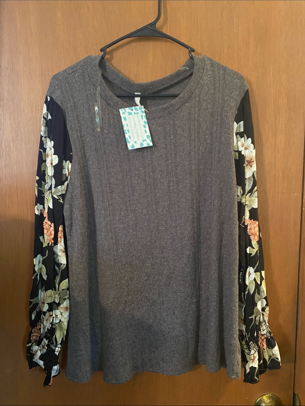 Hesed Women’s Gray Knit Top with Black Floral Sleeve Detail